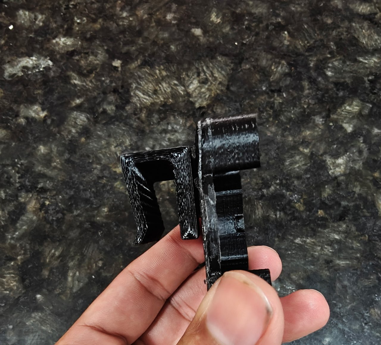 Collar clip screwed onto the back of the cradle