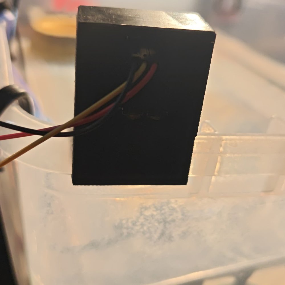 Back of the case on the rim: the clip and the wires leaving the back slot
